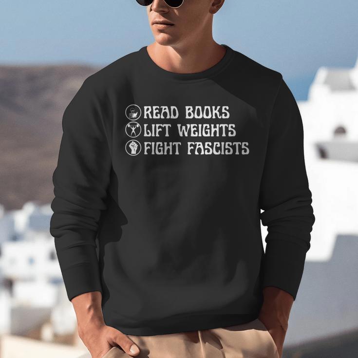 Read Books Lift Weights Fight Fascists Lovers Reading Unisex Sweatshirt