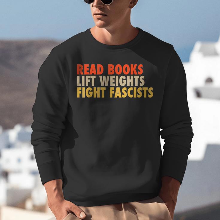 Read Books Lift Weights Fight Fascists Reading Humor Unisex Sweatshirt Read Books Lift Weights Fight Fascists Reading Humor Unisex Sweatshirt
