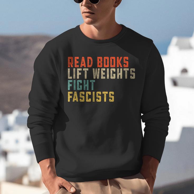 Read Books Lift Weights Fight Fascists Reading Unisex Sweatshirt Read Books Lift Weights Fight Fascists Reading Unisex Sweatshirt