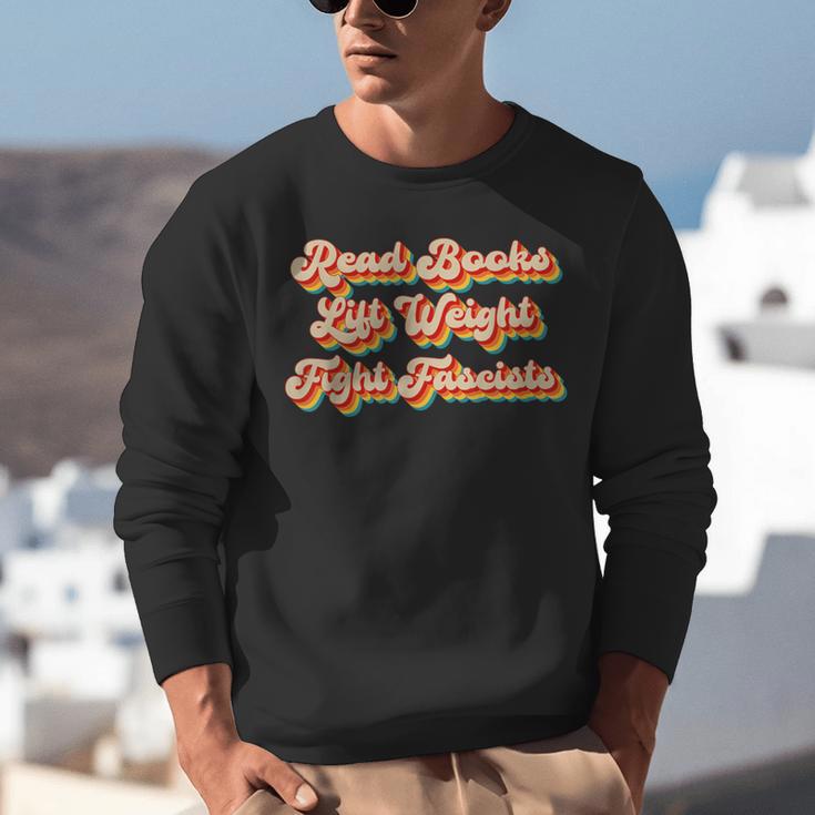 Read Books Lift Weights Fight Fascists Retro Reading Unisex Sweatshirt Read Books Lift Weights Fight Fascists Retro Reading Unisex Sweatshirt