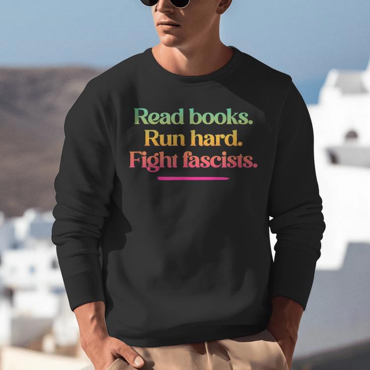 Read Books Run Hard Fight Fascists Unisex Sweatshirt