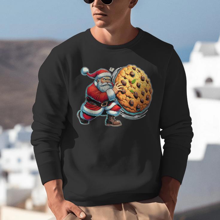 Santa Holding Cookie Xmas Baker Introvert Christmas Unisex Sweatshirt
