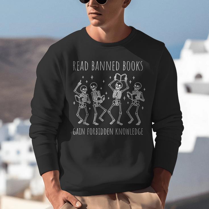 Skeleton Read Banned Books Gain Forbidden Knowledge Unisex Sweatshirt Skeleton Read Banned Books Gain Forbidden Knowledge Unisex Sweatshirt