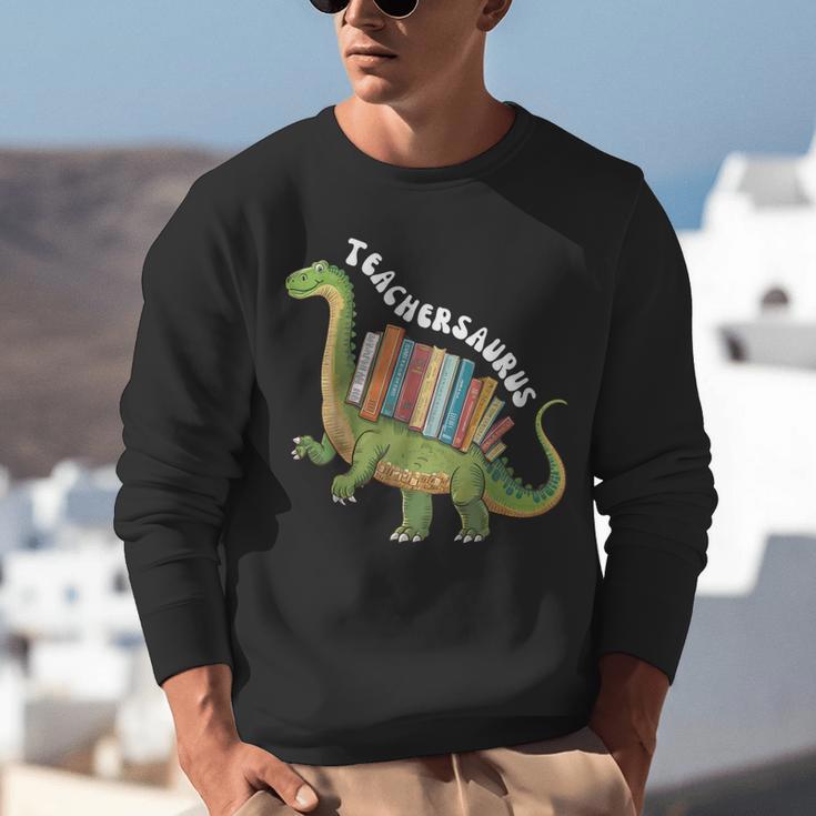 Teachersaurus Dinosaur Teachers Dino Reading Book Librarian Unisex Sweatshirt Teachersaurus Dinosaur Teachers Dino Reading Book Librarian Unisex Sweatshirt