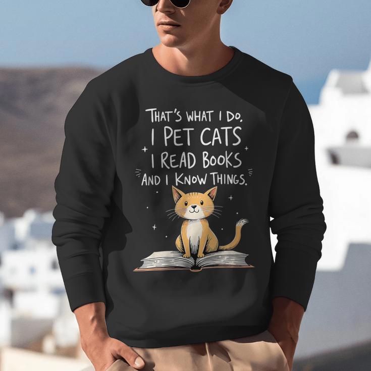 That's What I Do I Pet Cats I Read Books And I Know Things Unisex Sweatshirt
