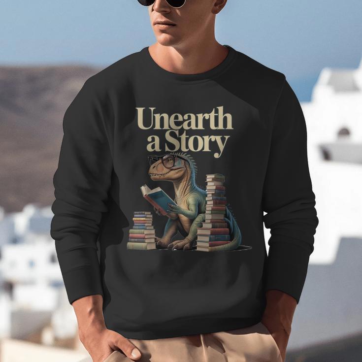 Unearth A Story Dinosaur Reading a Library Book Unisex Sweatshirt