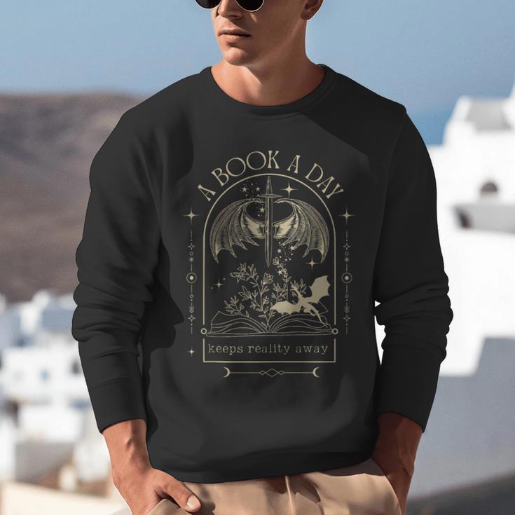 Vintage A Book a Day Keeps Reality Away Spicy Book Readers Unisex Sweatshirt