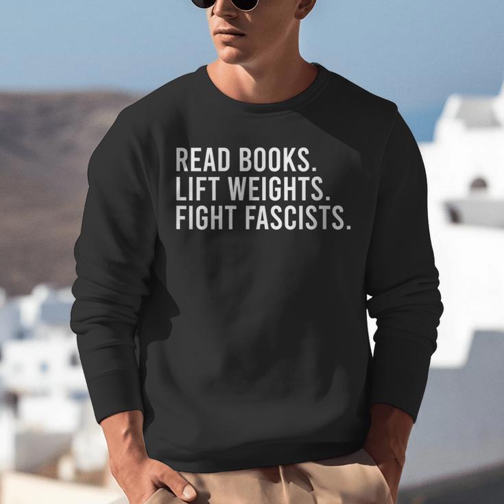 Women's Read Books Lift Weights Fight Fascists Reading Activism Unisex Sweatshirt Women's Read Books Lift Weights Fight Fascists Reading Activism Unisex Sweatshirt
