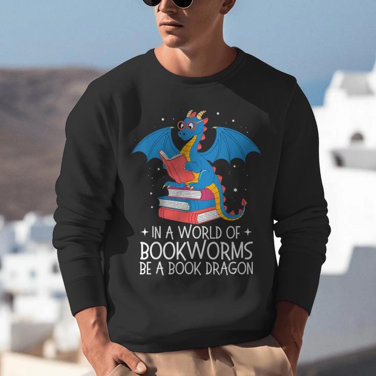 In A World Full Of Bookworms Be A Book Dragon Reading Unisex Sweatshirt
