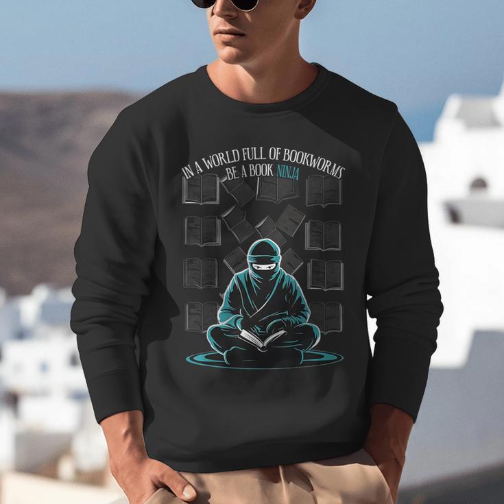 In A World Full Of Bookworms Be A Book Ninja Reading Reader Unisex Sweatshirt
