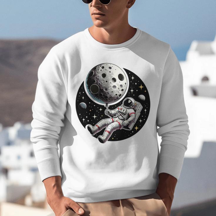 Astronaut Aesthetic Holding Moon Balloon Planets Introvert Unisex Sweatshirt