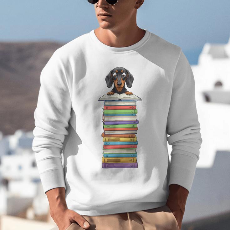 Cute Wiener Dog Dachshund Reading On Pile Of Books Unisex Sweatshirt Cute Wiener Dog Dachshund Reading On Pile Of Books Unisex Sweatshirt