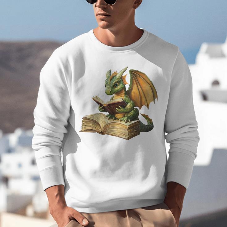 Dragon Bookworm Reading Book Graphic Unisex Sweatshirt Dragon Bookworm Reading Book Graphic Unisex Sweatshirt
