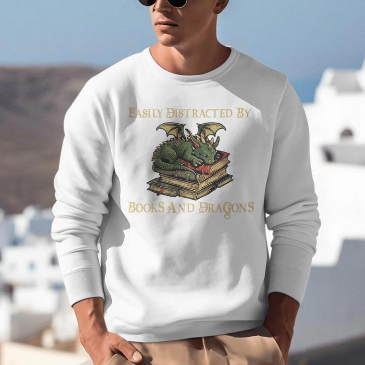 Easily Distracted By Books And Dragons Graphic Premium Unisex Sweatshirt