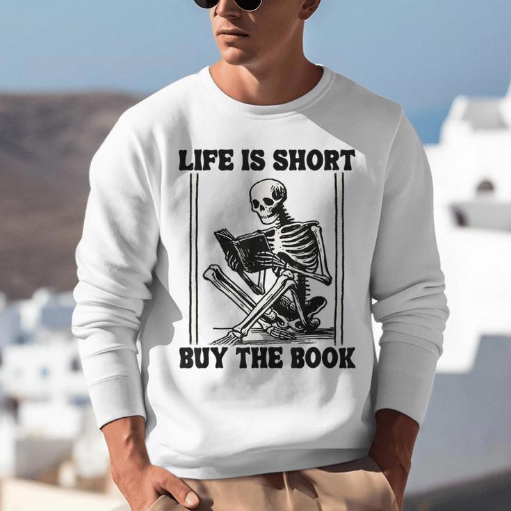 Life Is Short Buy The Book Skeleton Book Lover Reading Unisex Sweatshirt Life Is Short Buy The Book Skeleton Book Lover Reading Unisex Sweatshirt