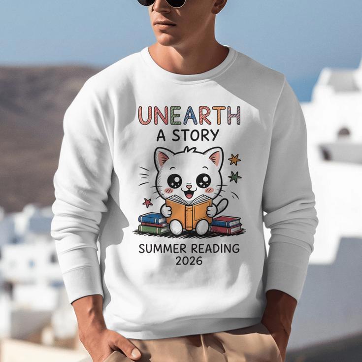 Unearth a Story Cute Kitten Summer Reading 2026 Cat Book Unisex Sweatshirt