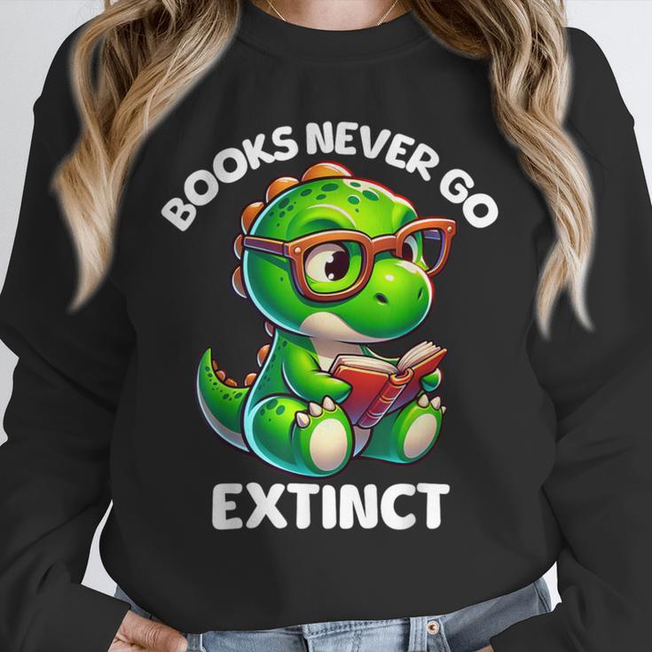 Books Never Go Extinct Reading Dinosaur Bookish Nerdy Unisex Sweatshirt Books Never Go Extinct Reading Dinosaur Bookish Nerdy Unisex Sweatshirt