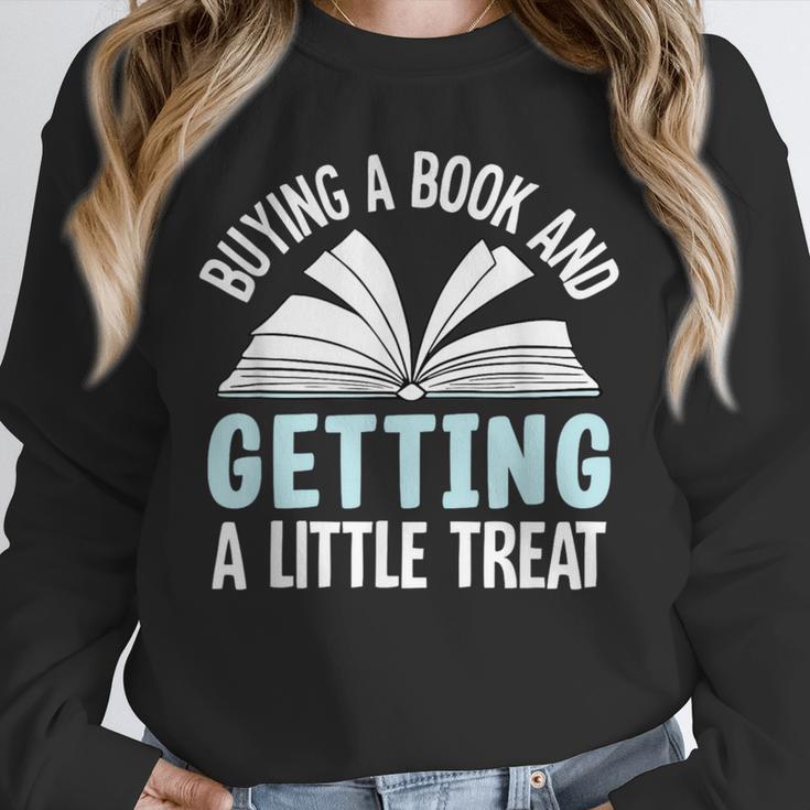 Buying A Book And Getting A Little Treat Unisex Sweatshirt