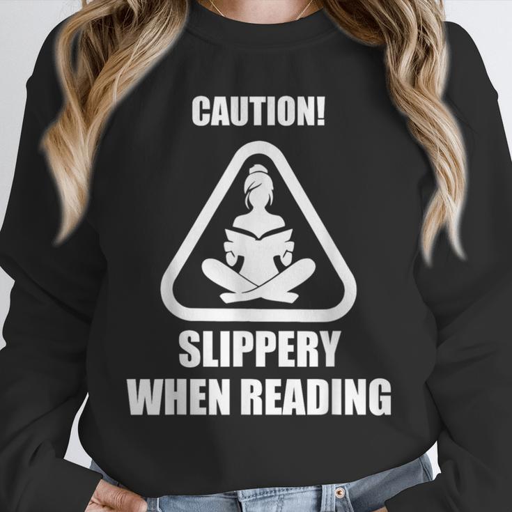 Caution Slippery When Reading Book Lover Unisex Sweatshirt