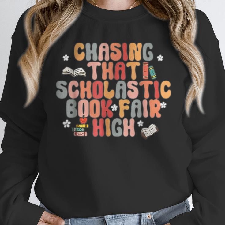 CHASING THAT SCHOLASTIC BOOK FAIR HIGH Unisex Sweatshirt