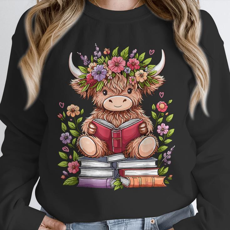 Cute Baby Highland Cow With Reading Book Bookworm Unisex Sweatshirt Cute Baby Highland Cow With Reading Book Bookworm Unisex Sweatshirt
