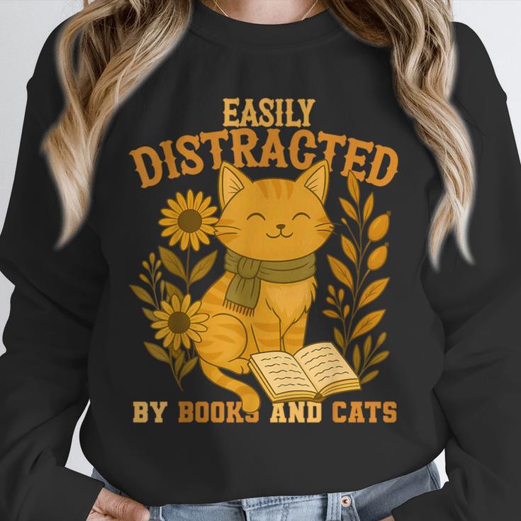 Easily Distracted By Cats And Books Cute Cat Book Lover Unisex Sweatshirt