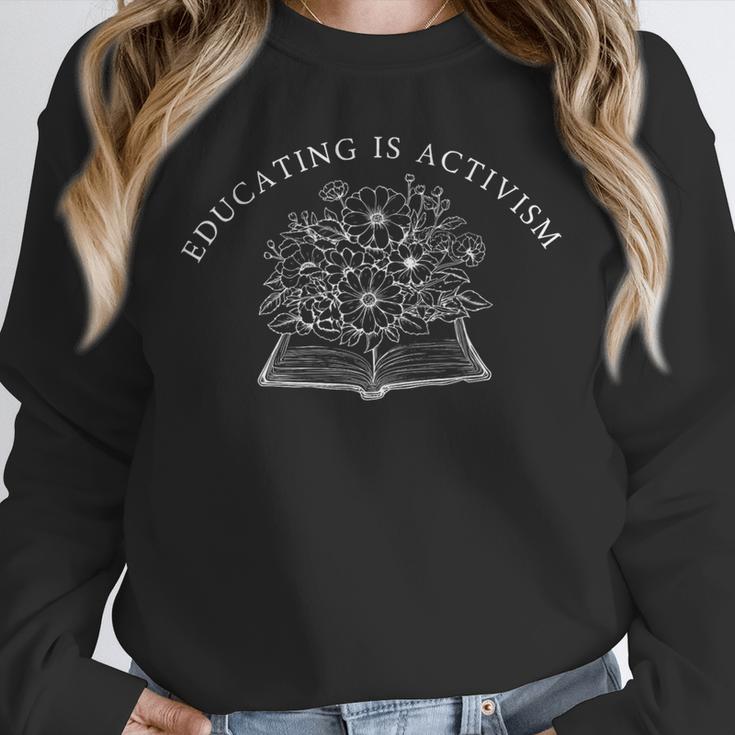 Educating Is Activism Social Education Teacher Book Flower Unisex Sweatshirt Educating Is Activism Social Education Teacher Book Flower Unisex Sweatshirt