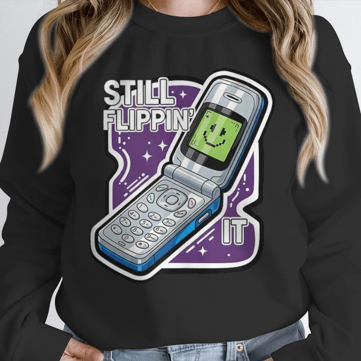 Still Flippin' It Retro Flip Phone 90s Y2K Nostalgia Unisex Sweatshirt Still Flippin' It Retro Flip Phone 90s Y2K Nostalgia Unisex Sweatshirt