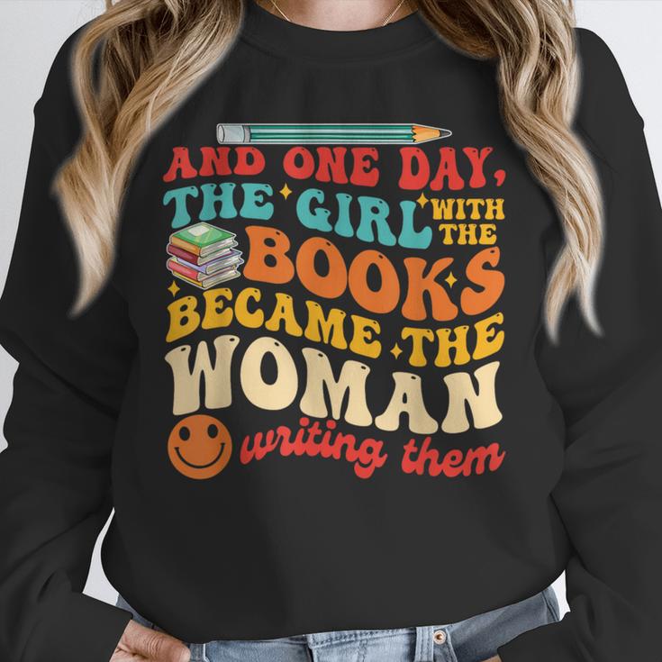 The Girl With The Books Became The Woman Writing Them Unisex Sweatshirt