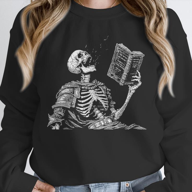Hilarious Skeleton Holding a Book And Laughing Gothic Unisex Sweatshirt