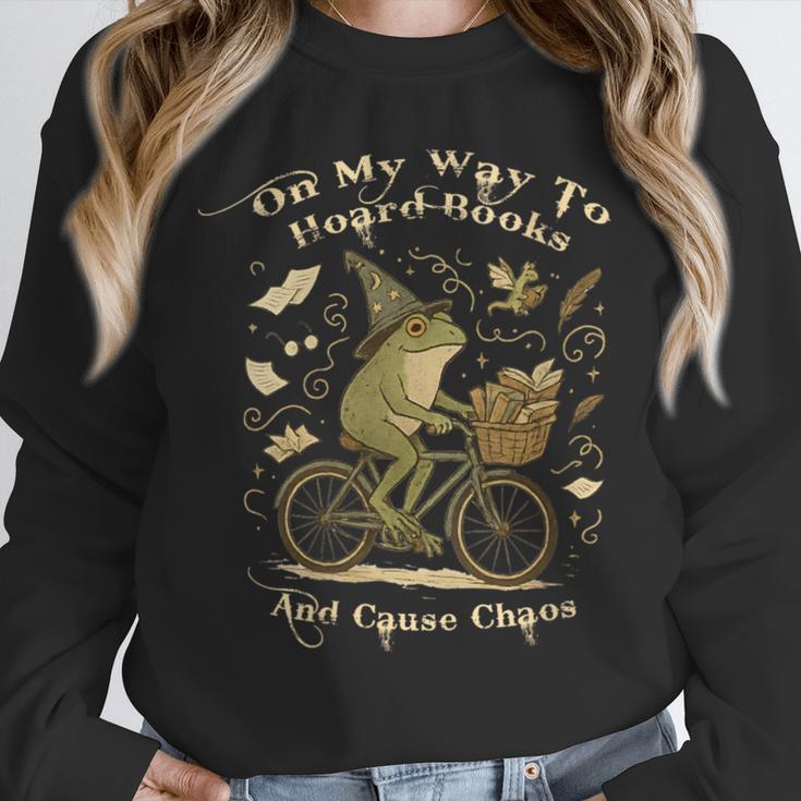 On My Way To Hoard Books And Cause Chaos Tom Foolery Frog Unisex Sweatshirt On My Way To Hoard Books And Cause Chaos Tom Foolery Frog Unisex Sweatshirt