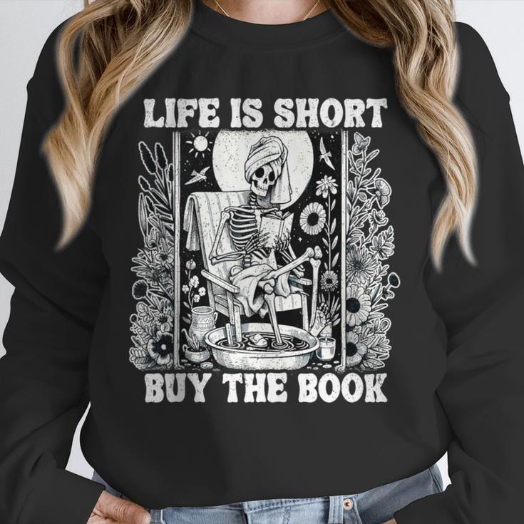 Life Is Short Buy The Book Introvert Skeleton Reading Unisex Sweatshirt Life Is Short Buy The Book Introvert Skeleton Reading Unisex Sweatshirt