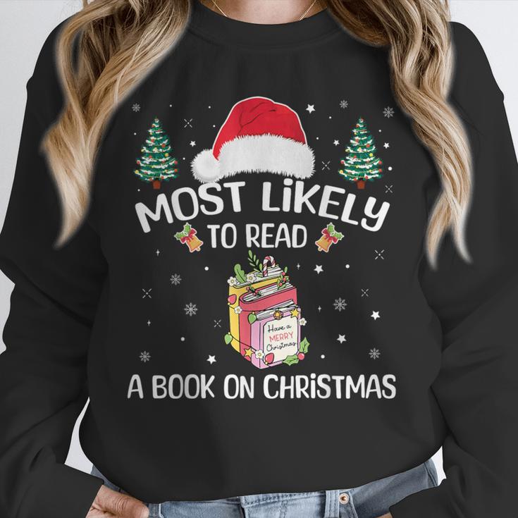 Most Likely To Read A Book On Christmas Love Reading Books Unisex Sweatshirt
