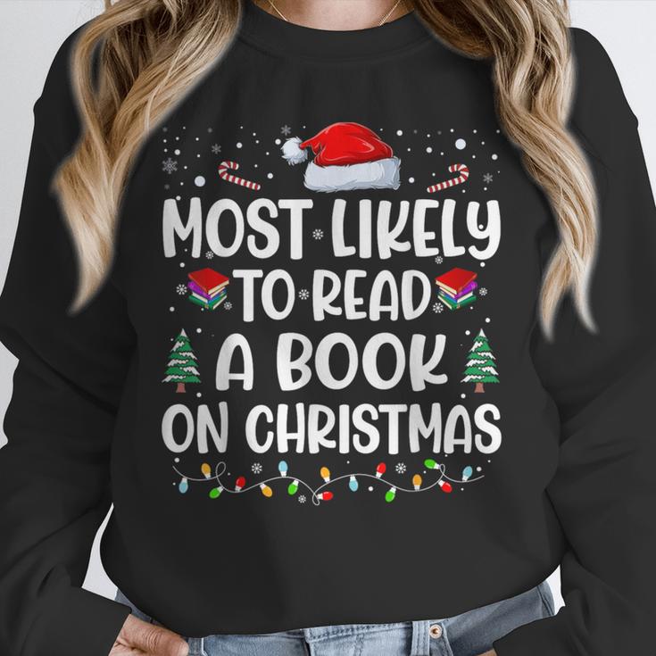 Most Likely To Read A Book On Christmas Matching Family Xmas Unisex Sweatshirt Most Likely To Read A Book On Christmas Matching Family Xmas Unisex Sweatshirt