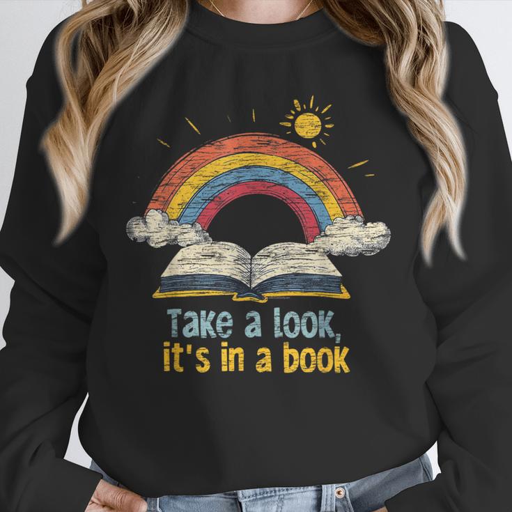 Take a Look It's In a Book Vintage Reading Teacher Rainbow Unisex Sweatshirt Take a Look It's In a Book Vintage Reading Teacher Rainbow Unisex Sweatshirt