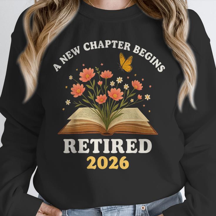 A New Chapter Begins Retired 2026 Floral Book Butterfly Tee Unisex Sweatshirt