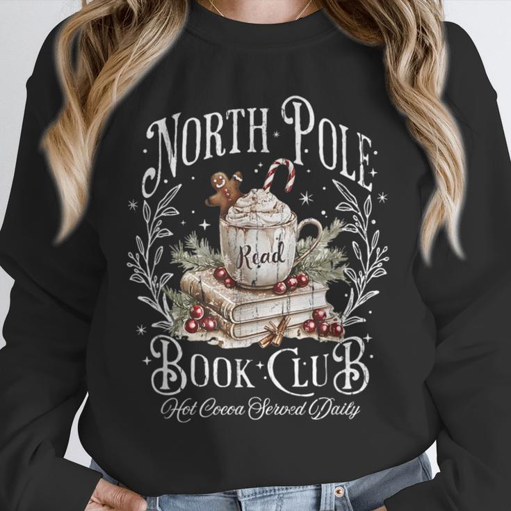North Pole Book Club Hot Cocoa Served Daily Unisex Sweatshirt