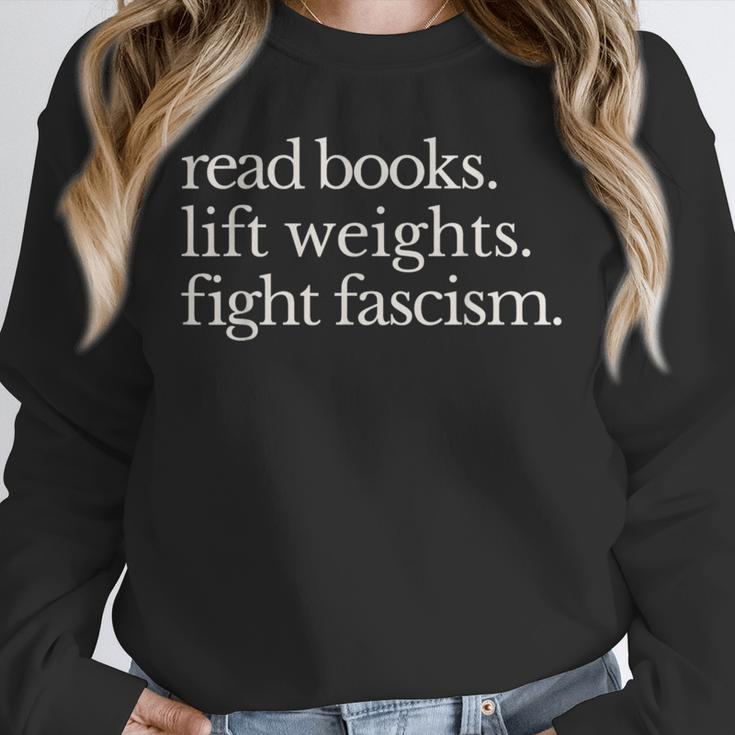 Read Books Lift Weights Fight Fascism Unisex Sweatshirt Read Books Lift Weights Fight Fascism Unisex Sweatshirt