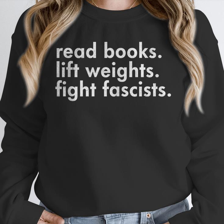 Read Books Lift Weights Fight Fascists Reading Activism Meme Unisex Sweatshirt Read Books Lift Weights Fight Fascists Reading Activism Meme Unisex Sweatshirt