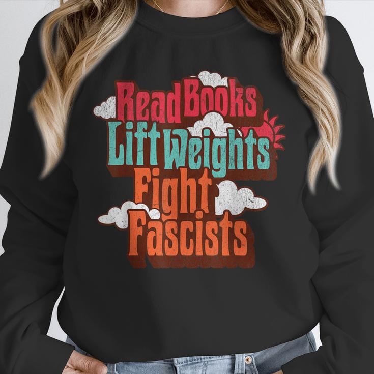 Read Books Lift Weights Fight Fascists Reading No Kings Unisex Sweatshirt Read Books Lift Weights Fight Fascists Reading No Kings Unisex Sweatshirt