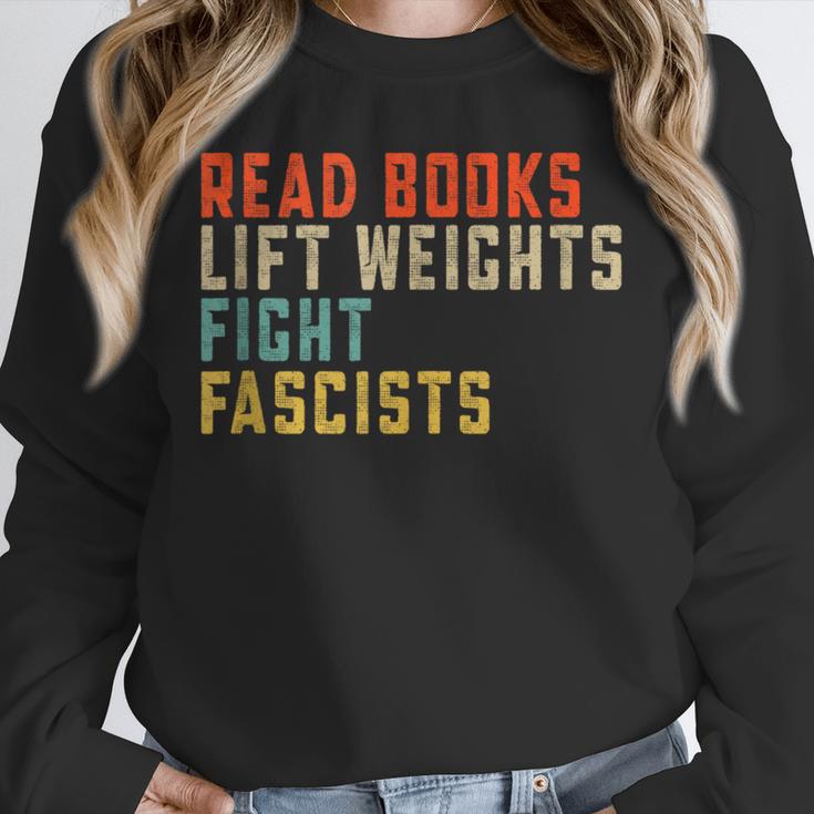 Read Books Lift Weights Fight Fascists Reading Unisex Sweatshirt Read Books Lift Weights Fight Fascists Reading Unisex Sweatshirt