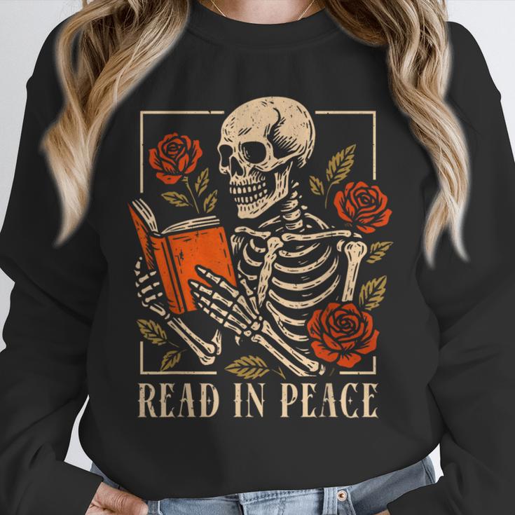 Read In Peace Skeleton Reading Book Halloween Teacher Unisex Sweatshirt