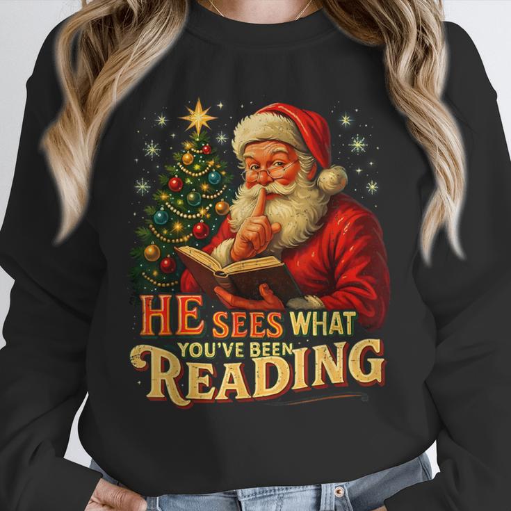 He Sees What You’Ve Been Reading Santa Book Lover Christmas Unisex Sweatshirt He Sees What You’Ve Been Reading Santa Book Lover Christmas Unisex Sweatshirt