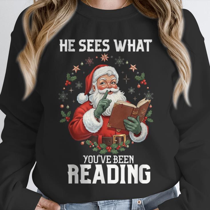 He Sees What You'Ve Been Reading Santa Book Lover Unisex Sweatshirt