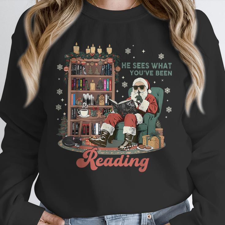 He Sees What You'Ve Been Reading Santa Christmas Bookish Unisex Sweatshirt He Sees What You'Ve Been Reading Santa Christmas Bookish Unisex Sweatshirt