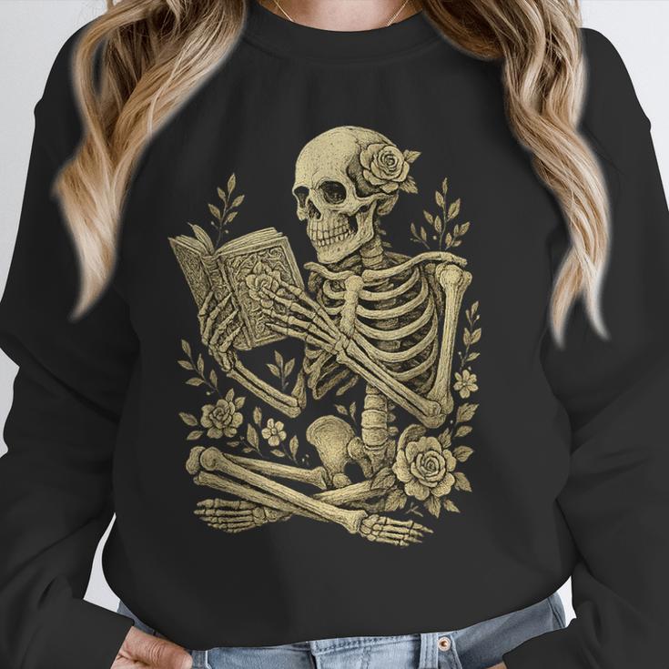 Skeleton Book Floral Skull Halloween Teacher Costume Unisex Sweatshirt Skeleton Book Floral Skull Halloween Teacher Costume Unisex Sweatshirt