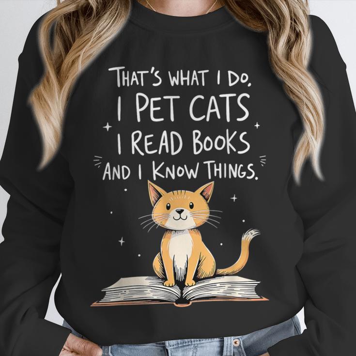 That's What I Do I Pet Cats I Read Books And I Know Things Unisex Sweatshirt