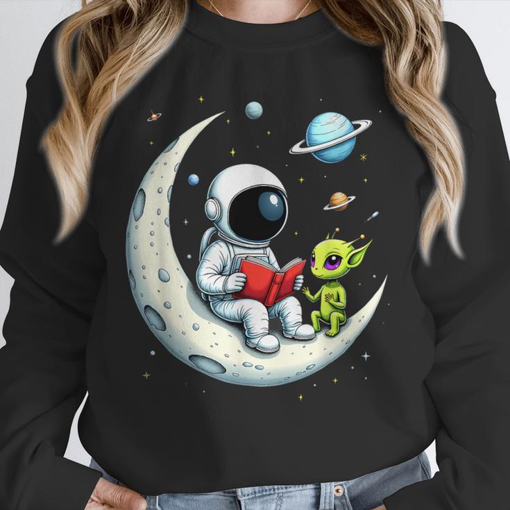 UFO Alien Astronaut Reading Book In Space Unisex Sweatshirt