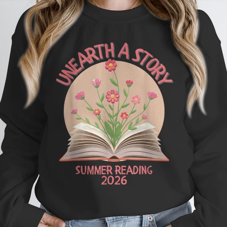 Unearth a Story 2026 Summer Reading Program Flowers Book Unisex Sweatshirt Unearth a Story 2026 Summer Reading Program Flowers Book Unisex Sweatshirt