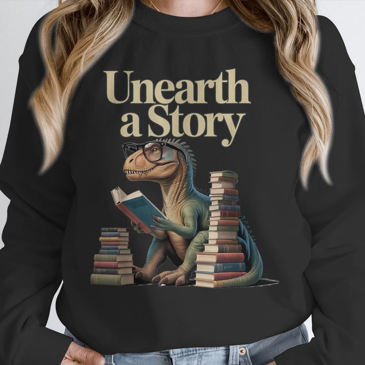 Unearth A Story Dinosaur Reading a Library Book Unisex Sweatshirt